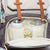 Nappy Backpack -  interior view of front pocket showing insulated bottle pockets