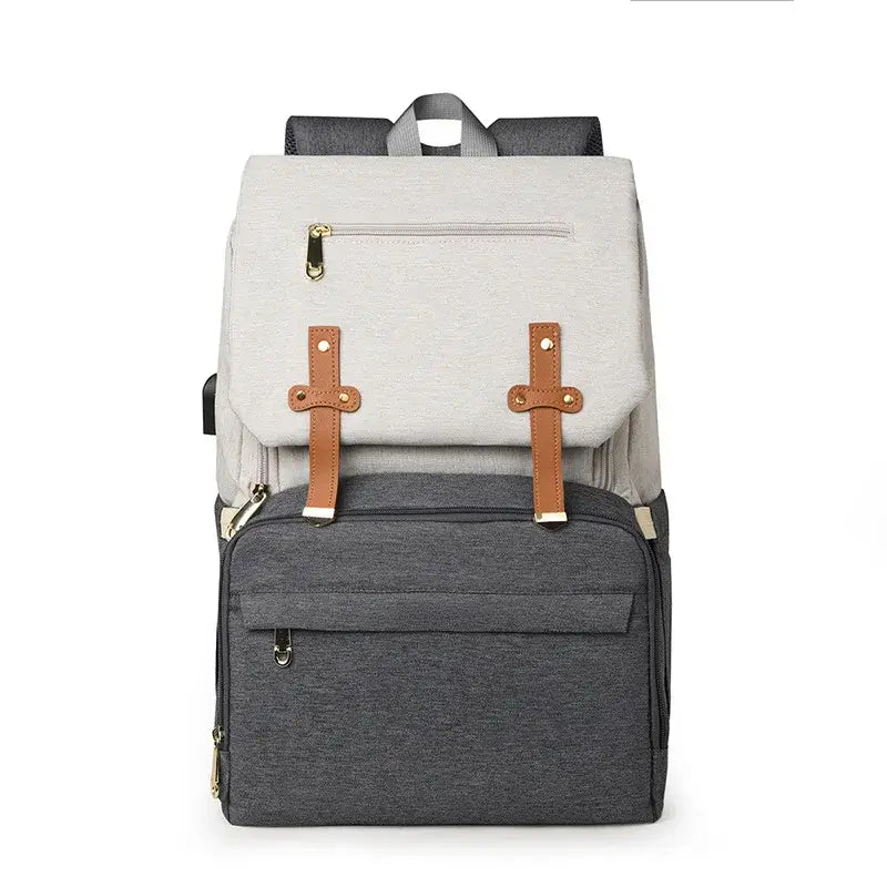 Nappy Bag Backpack in grey and white, featuring insulated bottle pockets, lightweight design, and a changing mat