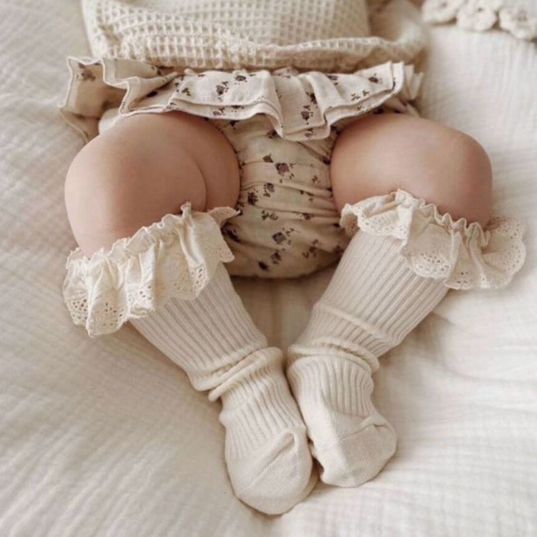 Baby wearing ribbed lace baby socks