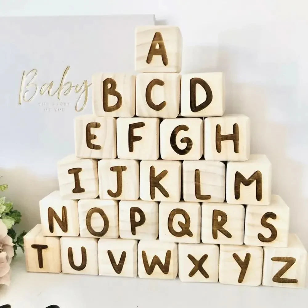 Wooden Alphabet Blocks arranged in a pyramid shape, showcasing letters A to Z for early education and play.