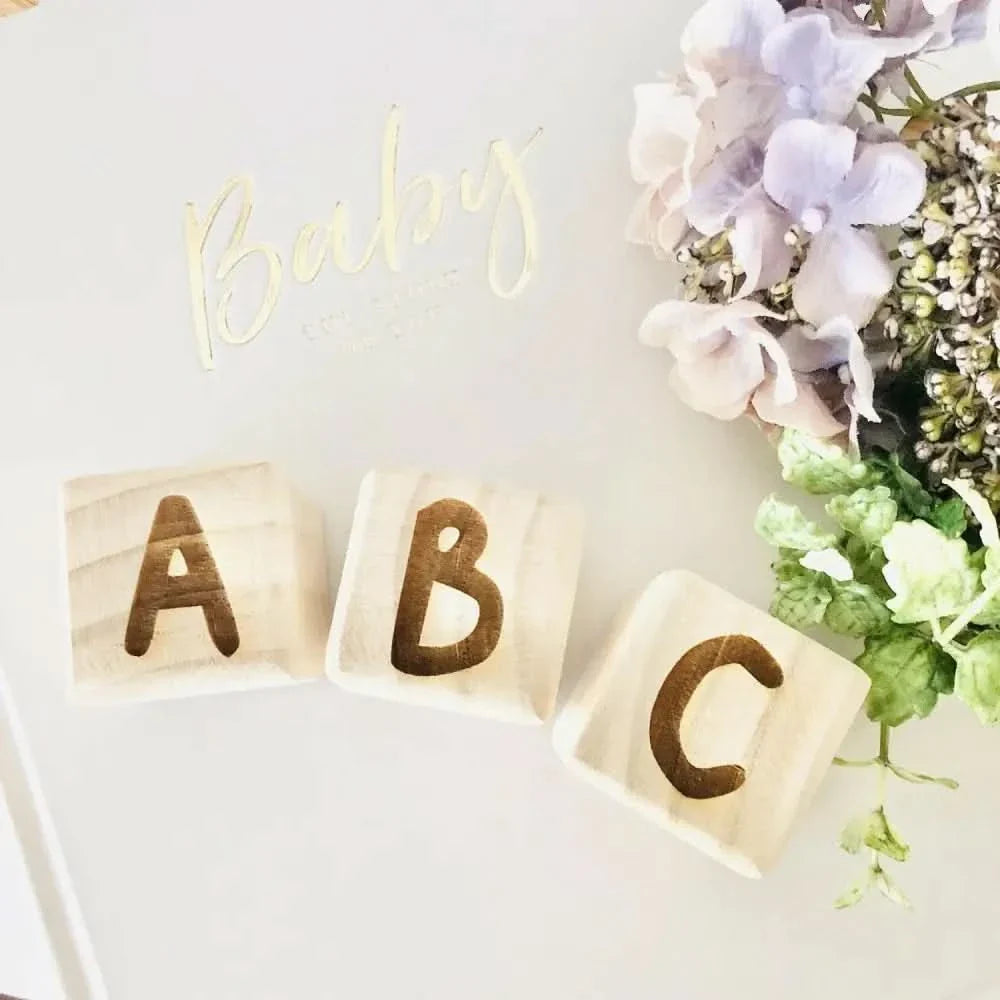 Wooden Alphabet Blocks showcasing A, B, and C, perfect for early learning and creative play.