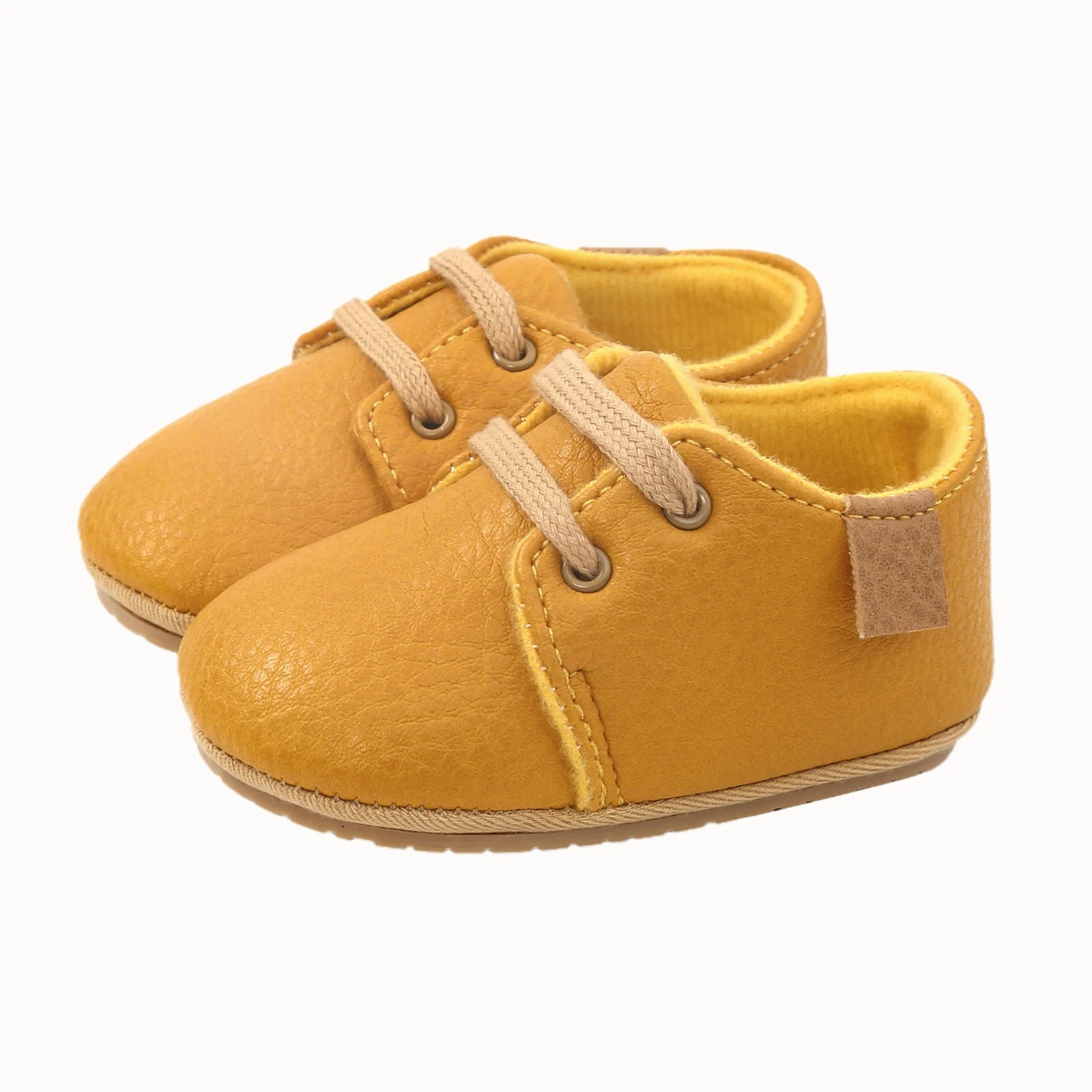 Yellow lace-up oxford style baby shoes
