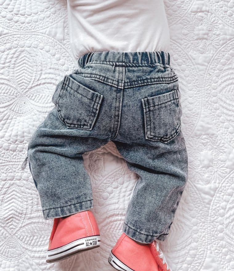 Baby wearing distressed baby jeans (in 0-6 months, 6-12 months, 12-18 month,  18-24 months & 2-3 years) - Lulu Babe
