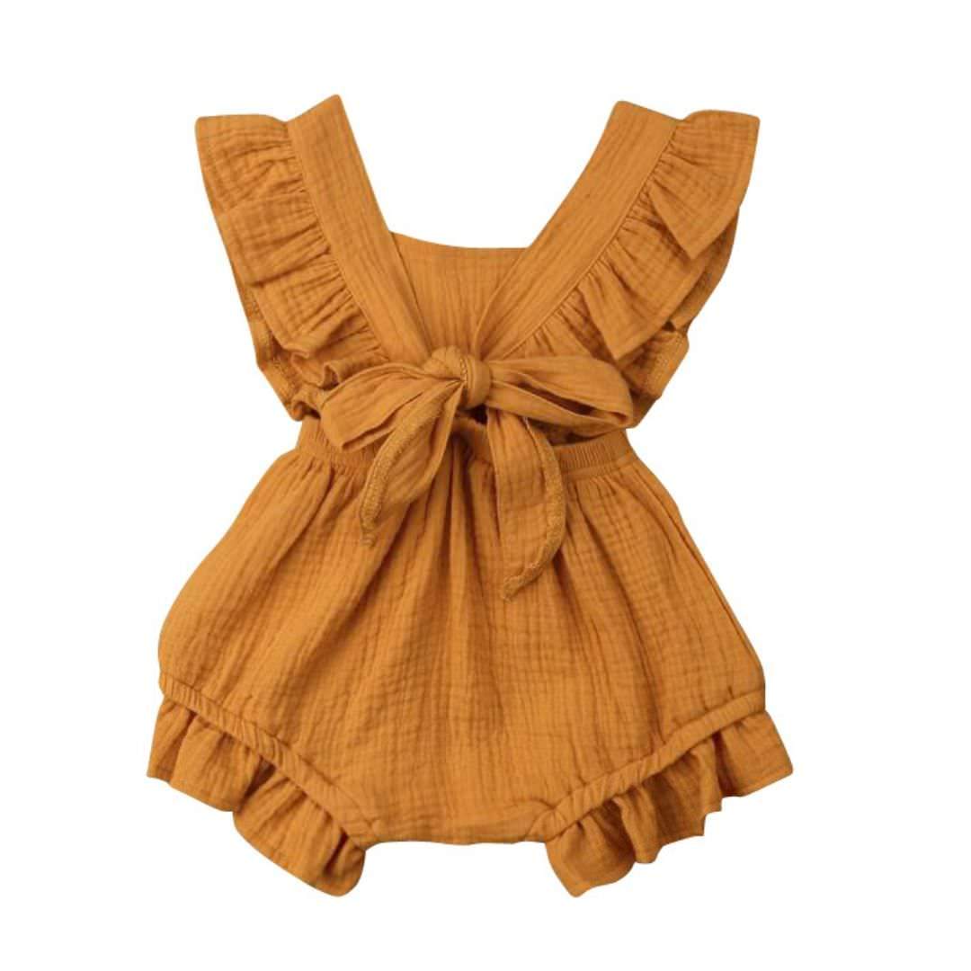 Back view of Willow ruffle baby girl romper in mustard