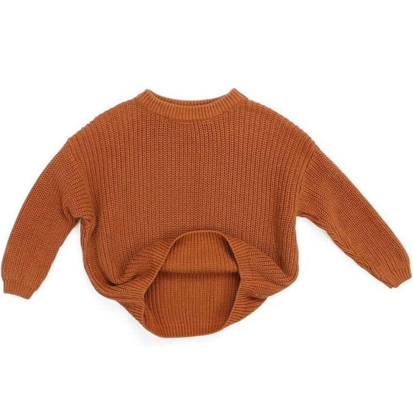 Chunky knit jumper in rust for babies and toddlers with crew neck and relaxed fit
